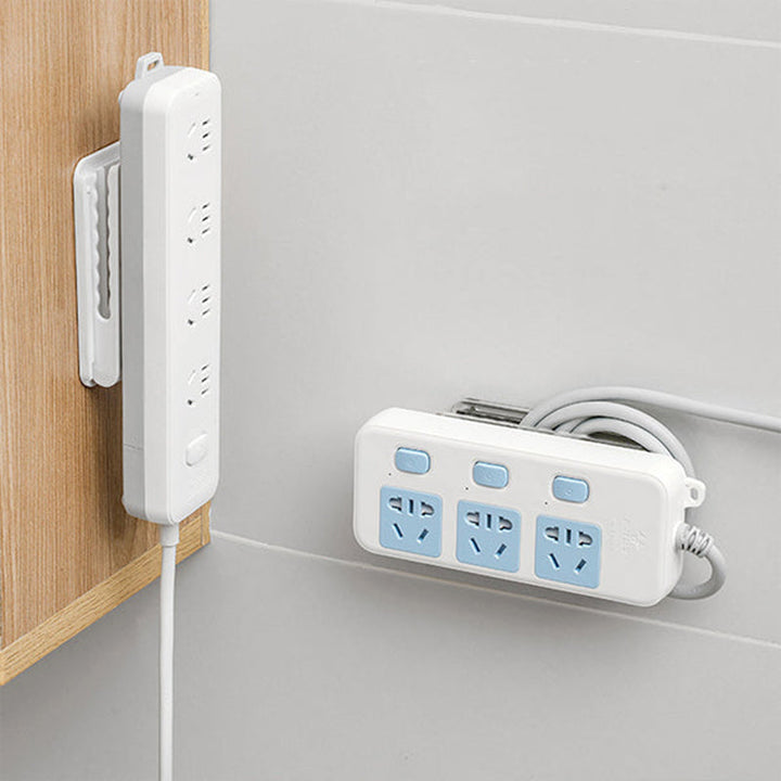 Multifunktionel stikholder, selvklæbende, hvidt PET-materiale, velegnet til ledninger og adaptere derhjemme.