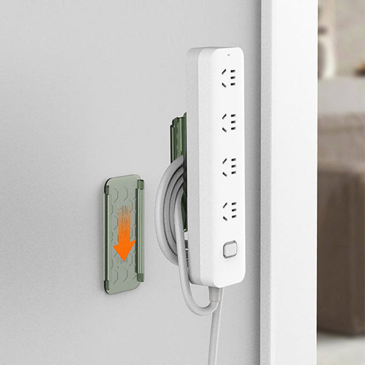 Multifunktionel stikholder, selvklæbende, hvidt PET-materiale, velegnet til ledninger og adaptere derhjemme.