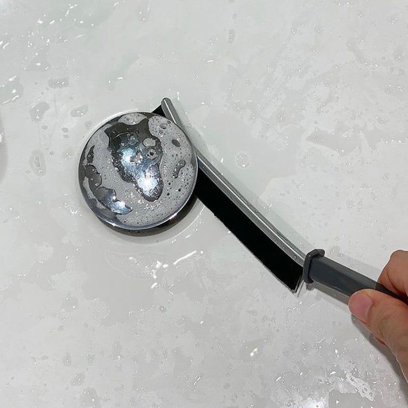 Multifunktionel spalte rengøringsbørste: holdbar børstestruktur, ergonomisk håndtag, kompakt størrelse, velegnet til hjem og bil.