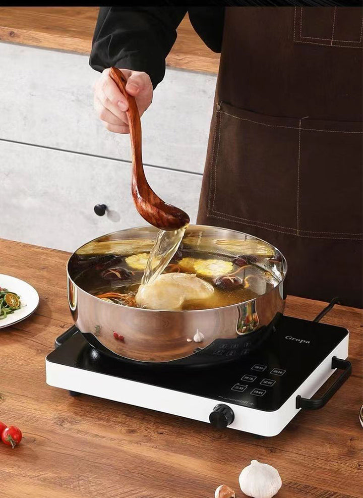 Alsidigt rustfrit stål pande, skinnende overflade, forskellige størrelser, egnet til alle kogepladetyper, moderne design.
