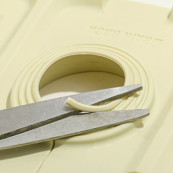 Multifunktionel silikonemåtte til køkken og badeværelse, moderne design, beige, grå, gule nuancer.