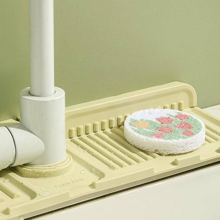 Multifunktionel silikonemåtte til køkken og badeværelse, moderne design, beige, grå, gule nuancer.
