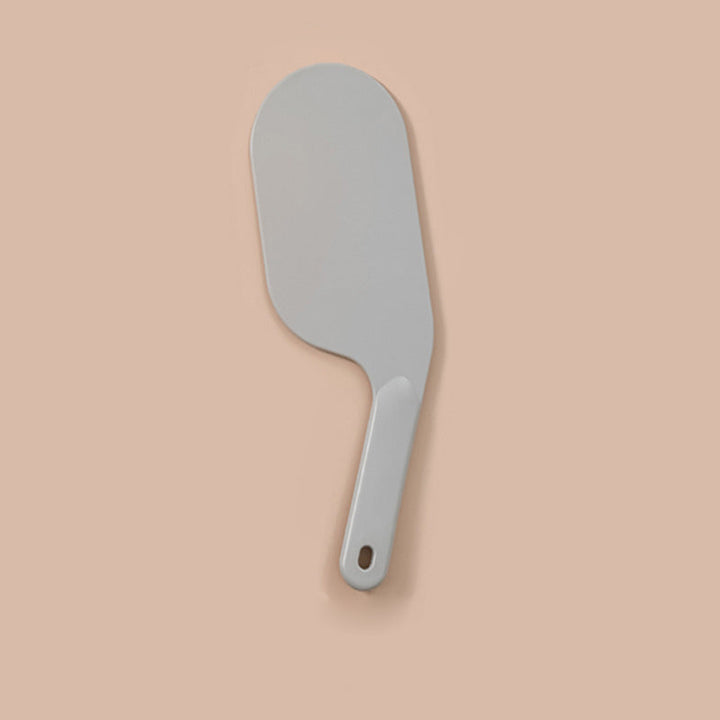 Multifunktionelt sengeværktøj i lys rød, hvid og grå med ergonomisk design til nem sengetid.