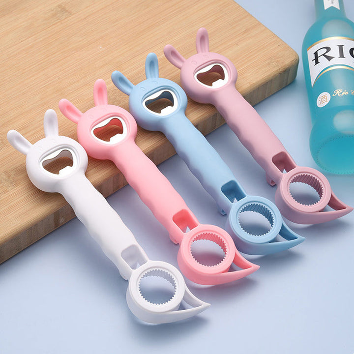 Multifunktionel sød flaskeåbner, fire farver: blå, lyserød, hvid, lilla, ergonomisk 4-i-1 design.
