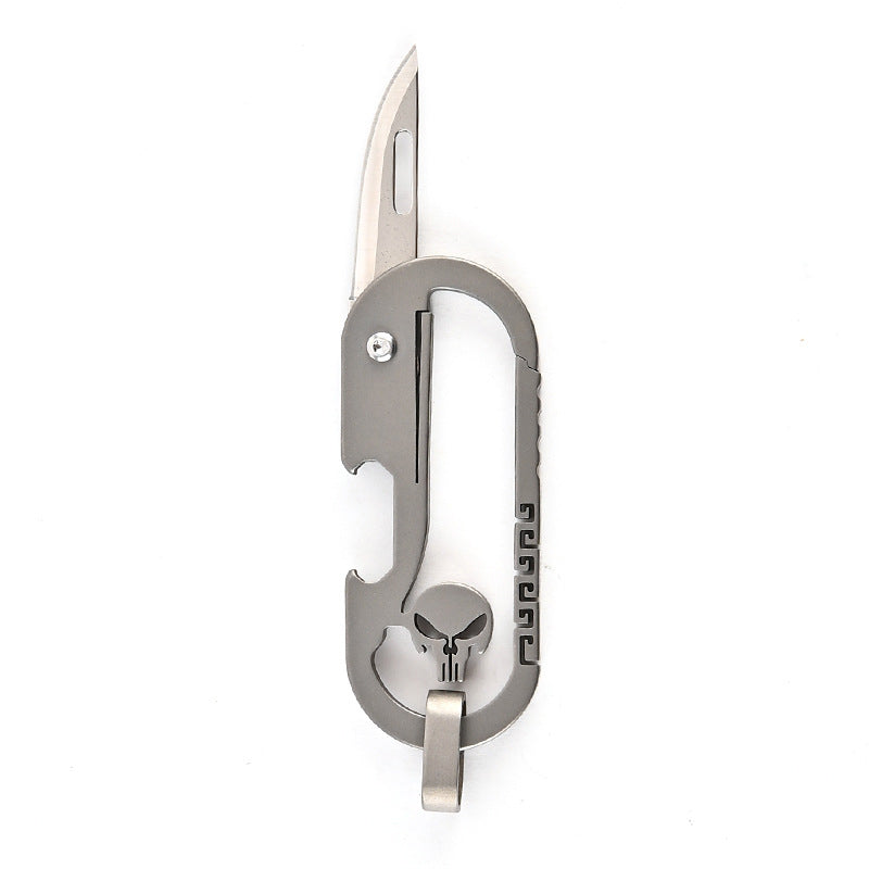 Multifunktionel titan kniv nøglering, moderne design, mørkegrå metal, nem at bære til hverdagsbrug.