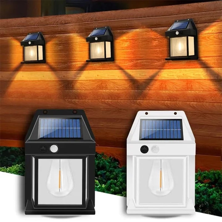Alsidig udendørs solcellelampe med bevægelsessensor, sort eller hvid, stilfuldt design, IP65-beskyttelse.