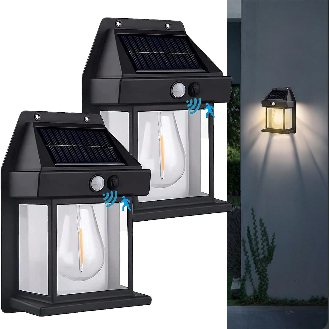 Alsidig udendørs solcellelampe med bevægelsessensor, sort eller hvid, stilfuldt design, IP65-beskyttelse.