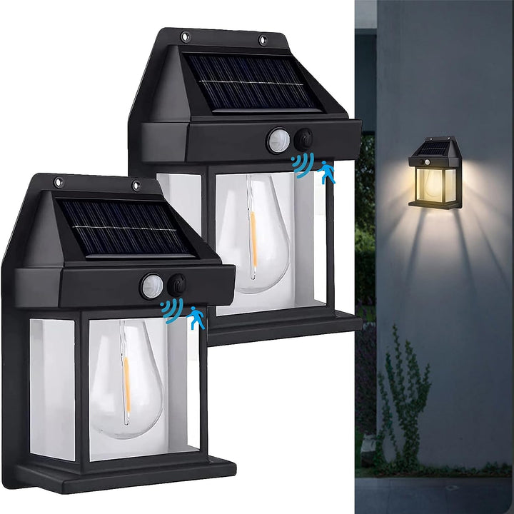 Alsidig udendørs solcellelampe med bevægelsessensor, sort eller hvid, stilfuldt design, IP65-beskyttelse.
