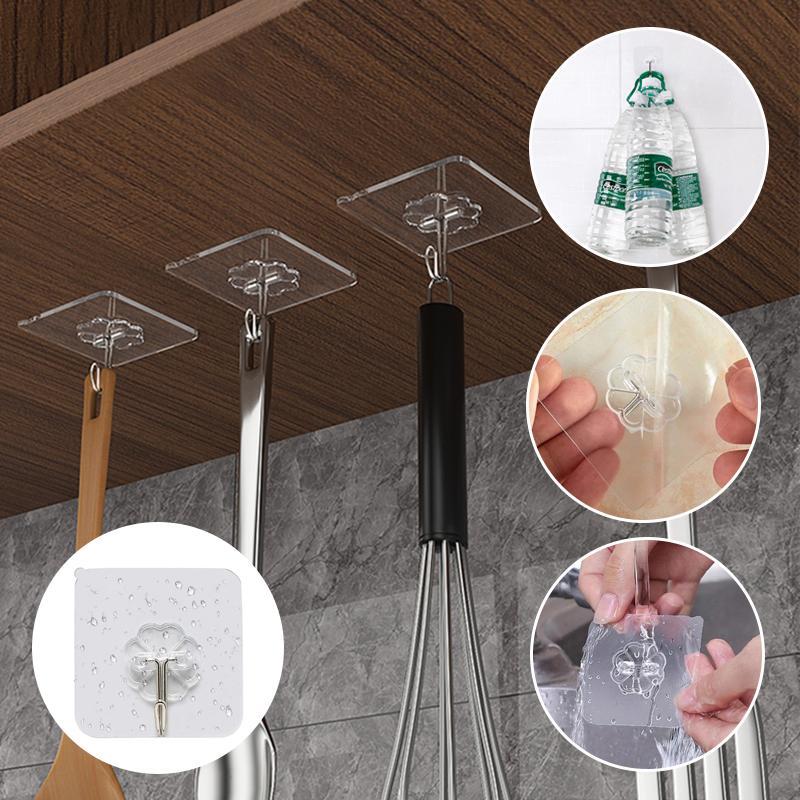Multifunktionelle klare klæbekroge, minimalistisk design, velegnet til ophængning af køkkenredskaber og tøj.