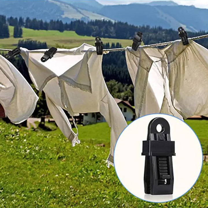 Multifunktionelle tarp clips til udendørs brug, sorte, savtakket klemme, strømlinet design, holdbar PA-plastik.