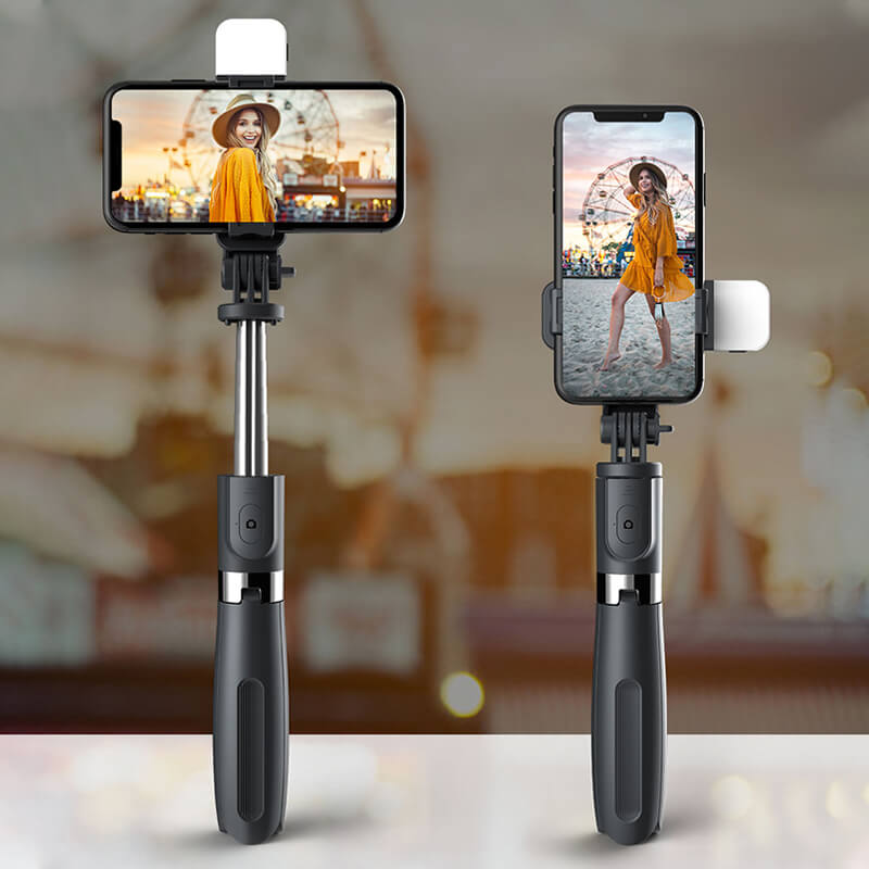 "Monitoiminen selfie stick jalusta valoilla, pitkä jatkotanko, muokattava korkeus, sopii älypuhelimille, musta tai valkoinen.