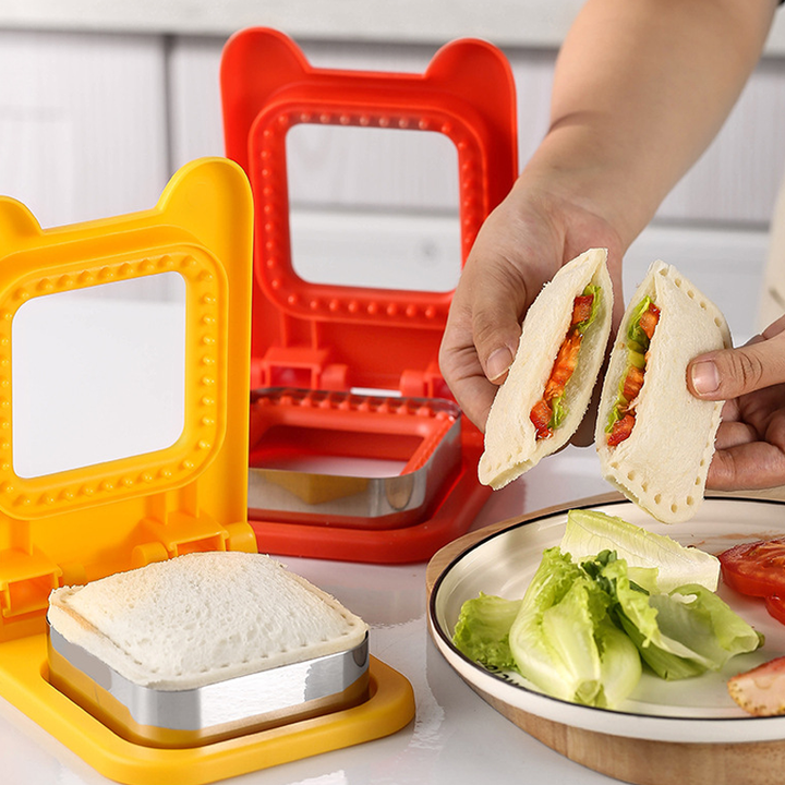 Multifarvet sandwich-forme og lukker i rød, gul og grøn til køkkenbrug.