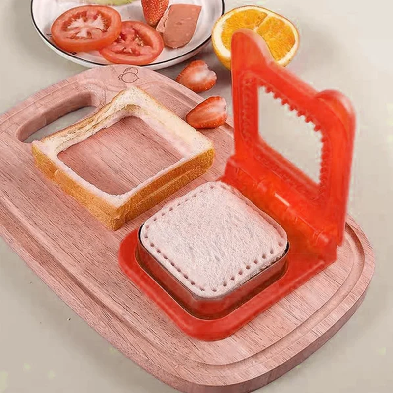 Multifarvet sandwich-forme og lukker i rød, gul og grøn til køkkenbrug.