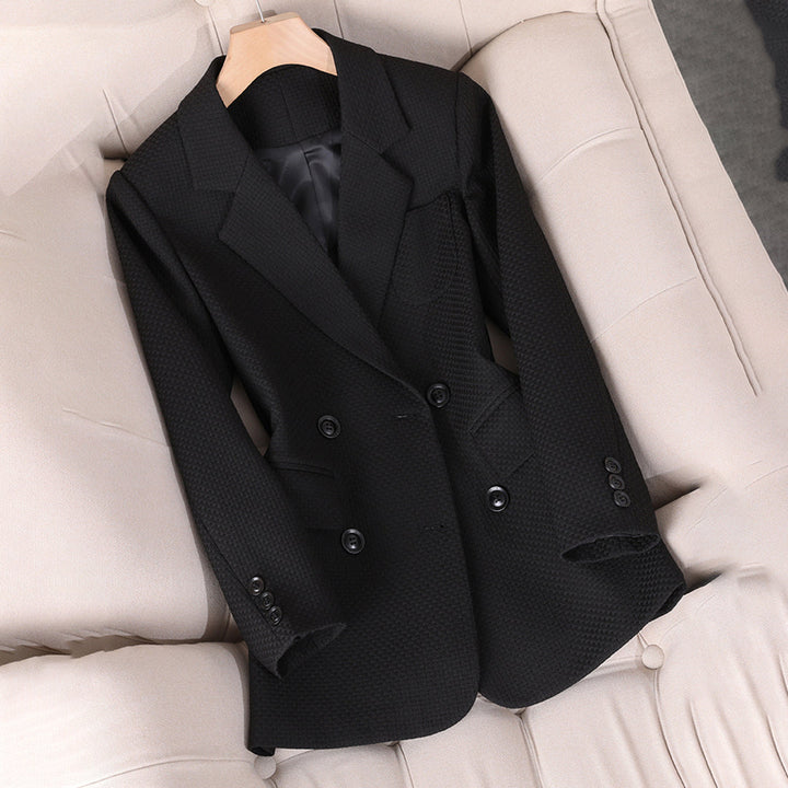 Formtilpasset dame blazer med dobbeltknapning, tekstureret overflade, klassisk stil. Perfekt til arbejde og fritid.