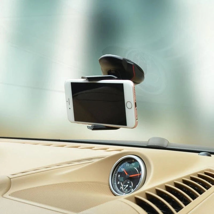 Musta 360° kääntyvä puhelinpidike autoon, tyylikäs muotoilu muistuttaa tietokonehiirtä, turvallinen silikoni ja imukuppi.