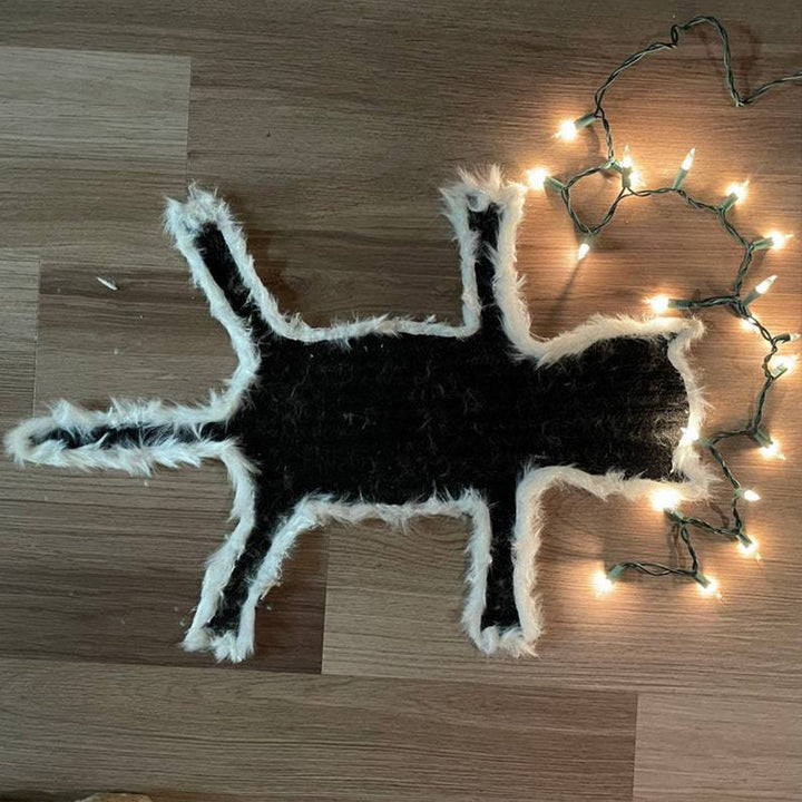 Sjov sort kattekussen med LED-lys, 40x60cm, tilføjer legende lys og julehygge til hjemmet.