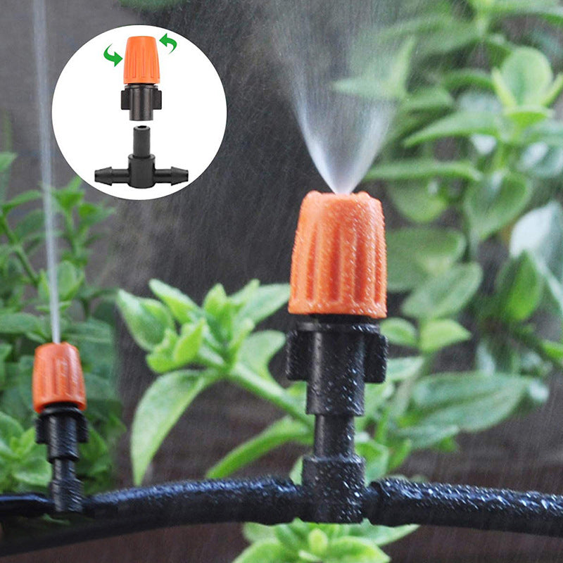 Sort og orange justerbar dryp-sprinkler til haven, præcis vanding, lavet af POM-plast, vandbesparende til haven.