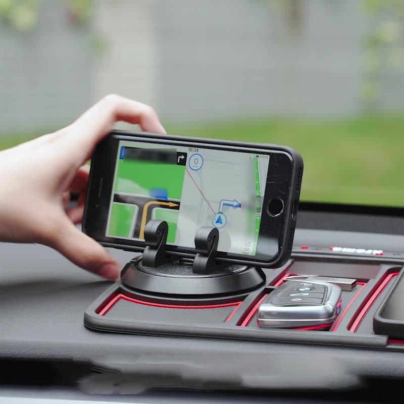 Mobilholder til bil i sort og rød, lavet af PVC med skridsikker måtte, 360-graders rotation og aromaterapi-funktion.