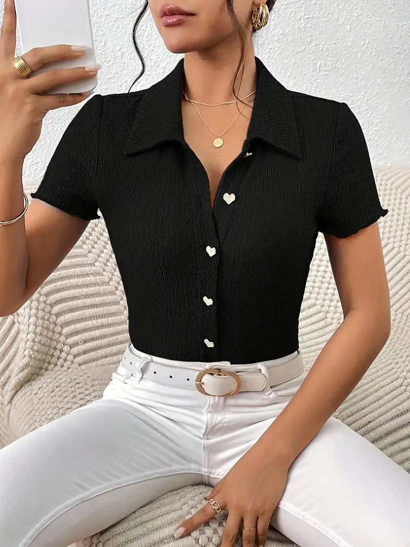 Dame sort kortærmet bluse til fritidsbrug, afslappet design, god pasform, perfekt til sommer.