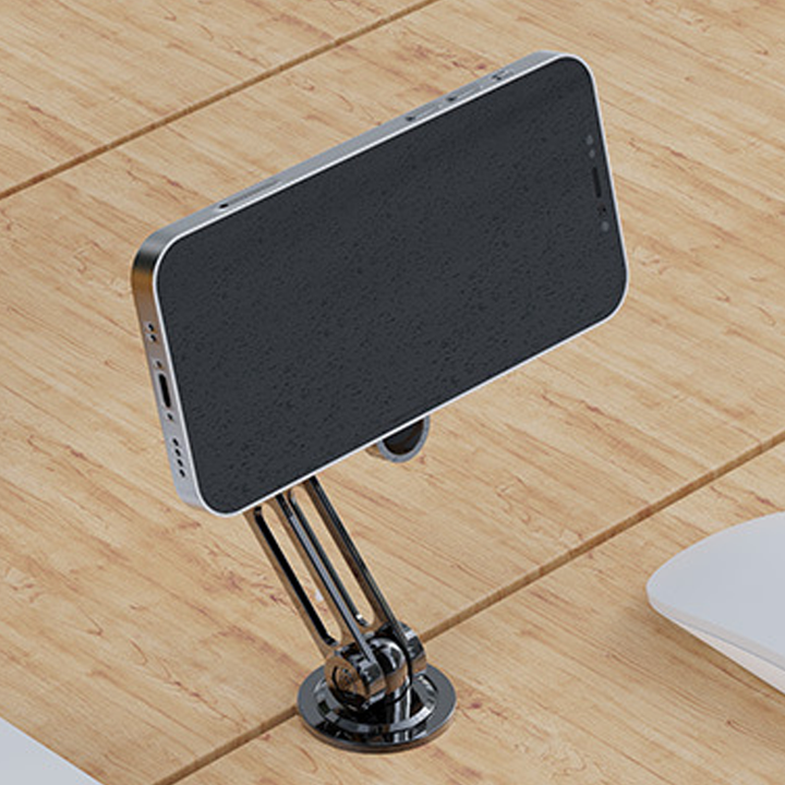 Universel 360° bilholder til telefon i sort, med magnetisk montering, elegant design, sikrer sikker og nem brug under kørsel.