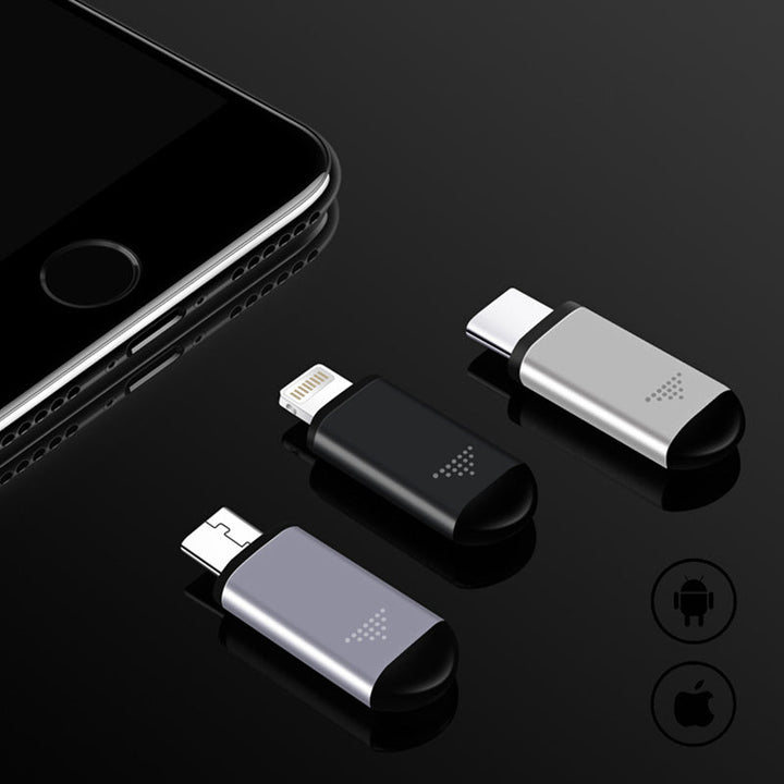 Sort multifunktionel fjernbetjening til smartphones, der styrer de fleste enheder, inklusive silikonecover og nøglering.