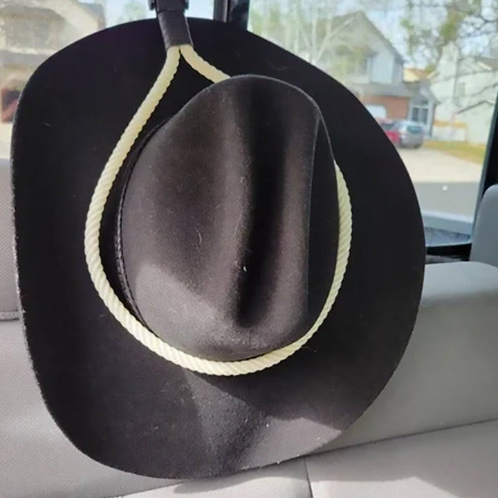 Mustavalkoinen auton cowboyhatun pidike, kestävä muotoilu nahkaisella nauhalla, sopii monenlaisiin hattuihin.