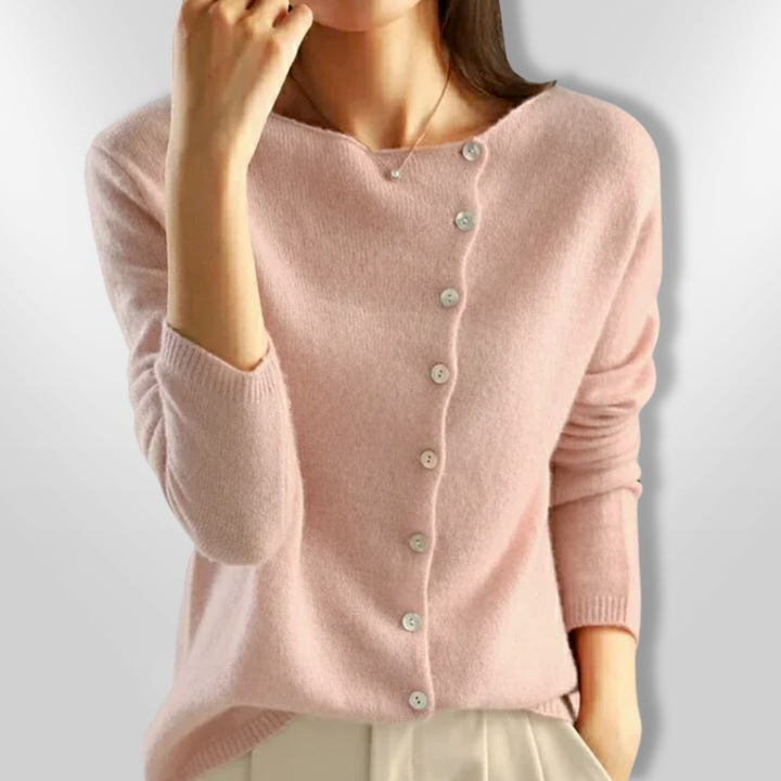Dame åben cardigan i en blød, beige farve med et åbent snit og lange ærmer, perfekt til afslappet og festlig brug.