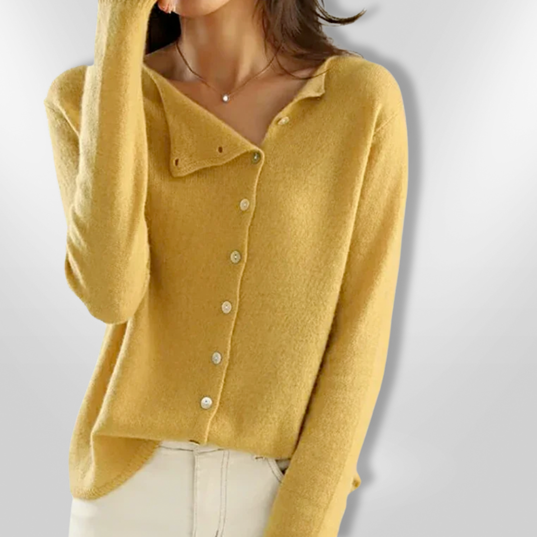 Dame åben cardigan i en blød, beige farve med et åbent snit og lange ærmer, perfekt til afslappet og festlig brug.