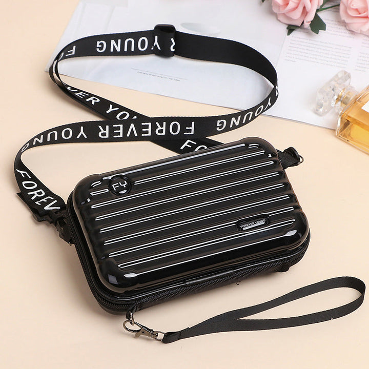 Dame PVC mini skuldertaske, stilfuldt og kompakt design, justerbare stropper, gul farve, luksus indvendigt.
