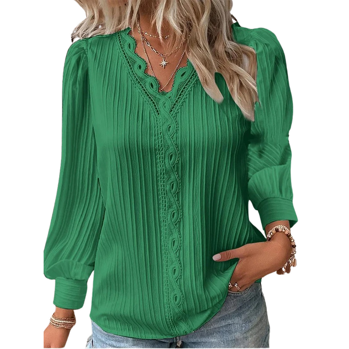 Dame V-hals blonde bluse, let chiffon stof og elegante blonde detaljer, et stilfuldt valg.