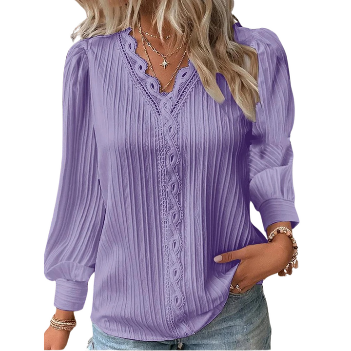 Dame V-hals blonde bluse, let chiffon stof og elegante blonde detaljer, et stilfuldt valg.