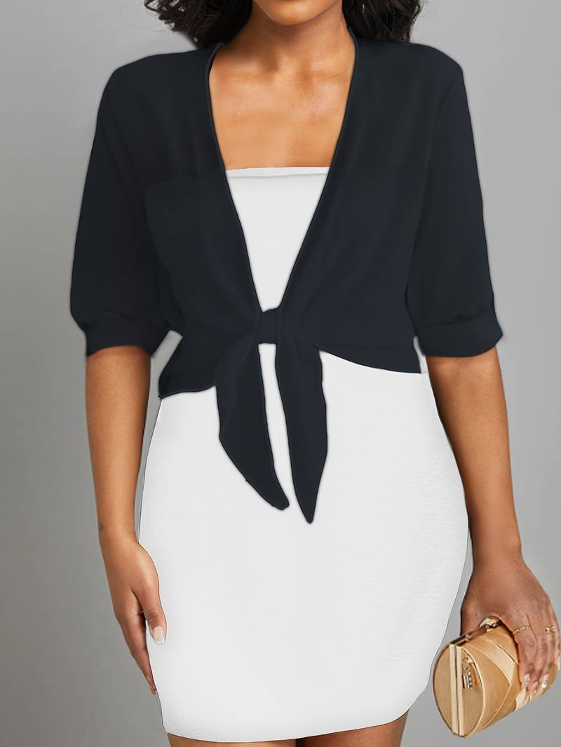 Dame åben bomuldsbluse let og luftigt materiale, åben front, feminin charme, et elegant forårsvalg.