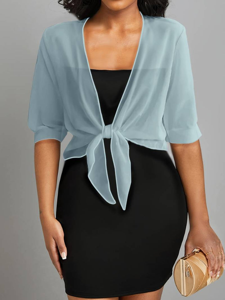 Dame åben bomuldsbluse let og luftigt materiale, åben front, feminin charme, et elegant forårsvalg.
