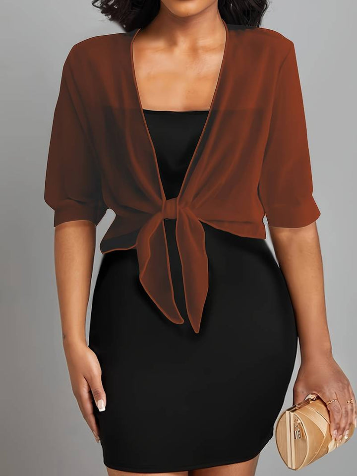 Dame åben bomuldsbluse let og luftigt materiale, åben front, feminin charme, et elegant forårsvalg.