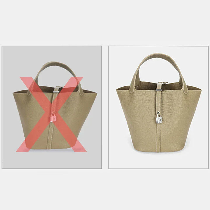 Damehåndtaske i beige med organiseret interiør, lavet af kunstlæder, elegant og rummelig, forsidevisning, stilfuldt look.