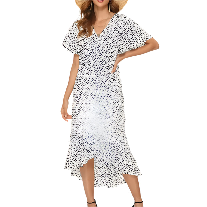 Dame boho chiffonkjole med blomstermønster, V-udskæring, flæsekanter og sideslids, perfekt til en sommerdag.