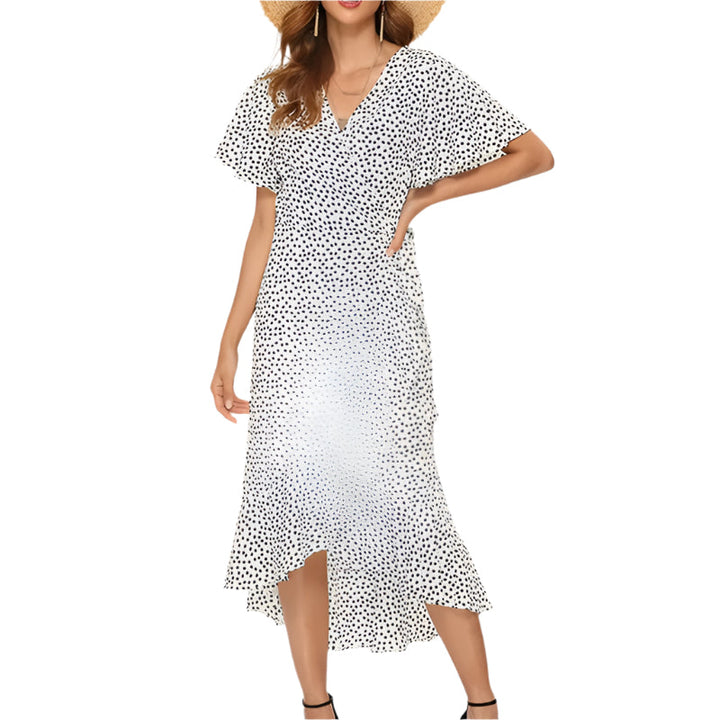 Dame boho chiffonkjole med blomstermønster, V-udskæring, flæsekanter og sideslids, perfekt til en sommerdag.