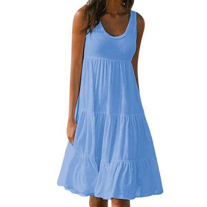 Dame boho-stil sommerkjole med flæse, pink, mønstret, luftig og let, perfekt til solrige dage.