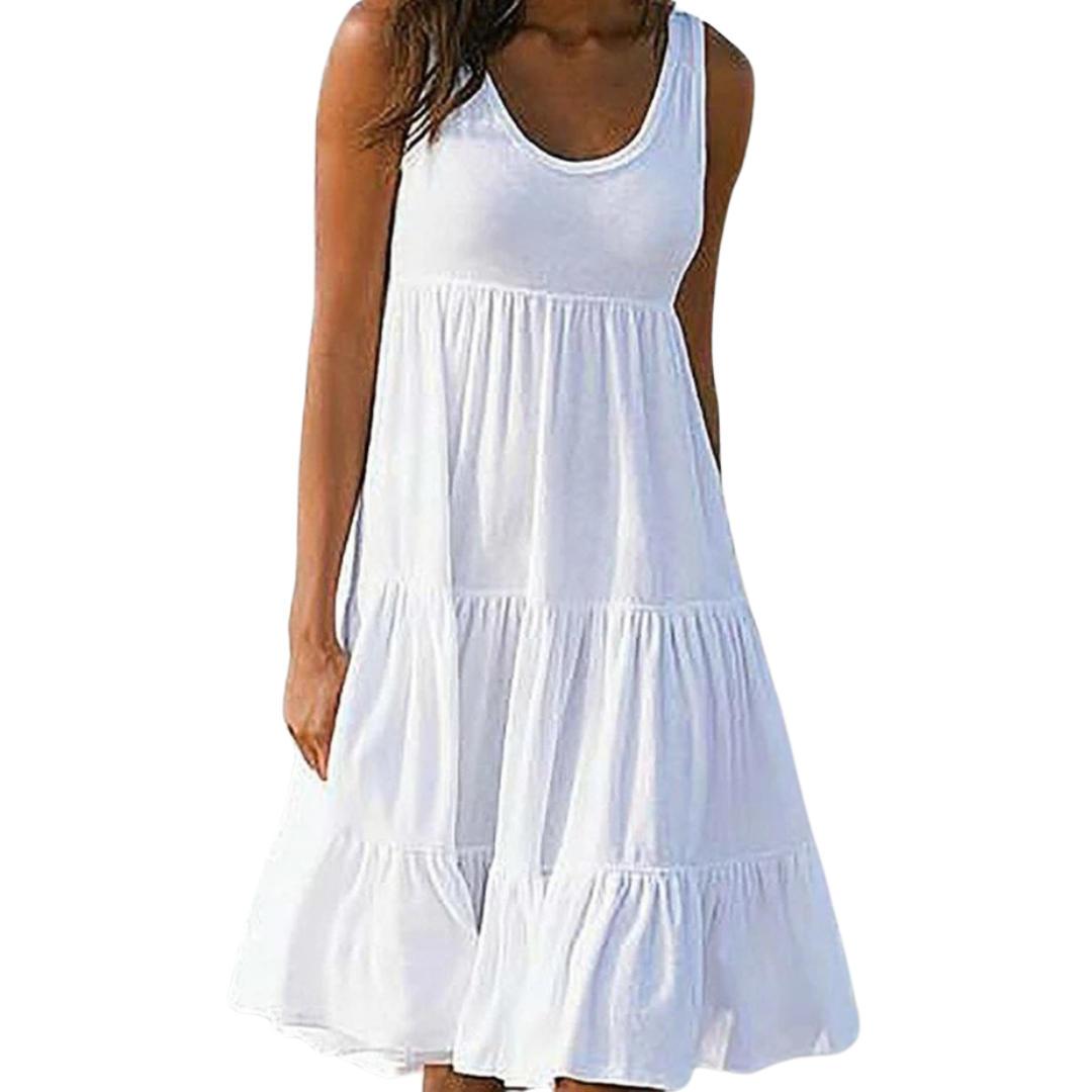 Dame boho-stil sommerkjole med flæse, pink, mønstret, luftig og let, perfekt til solrige dage.
