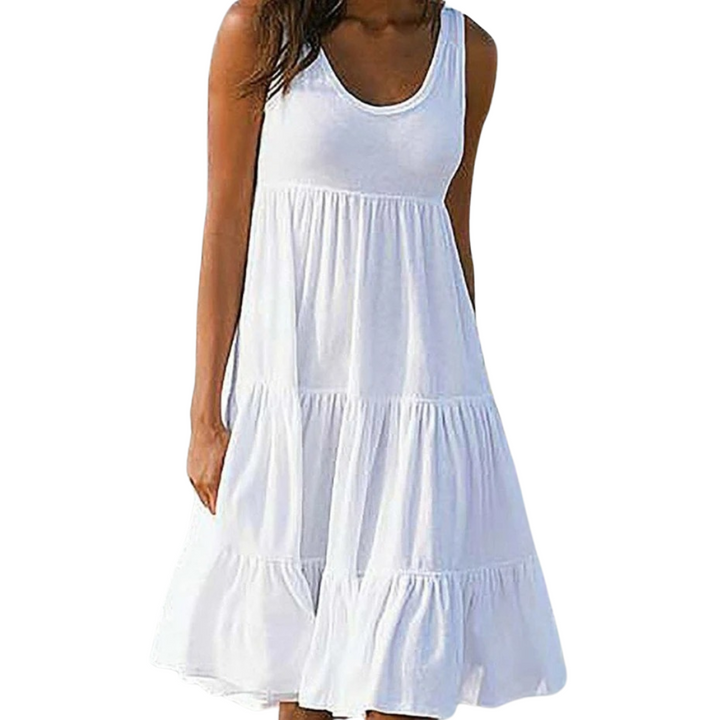 Dame boho-stil sommerkjole med flæse, pink, mønstret, luftig og let, perfekt til solrige dage.