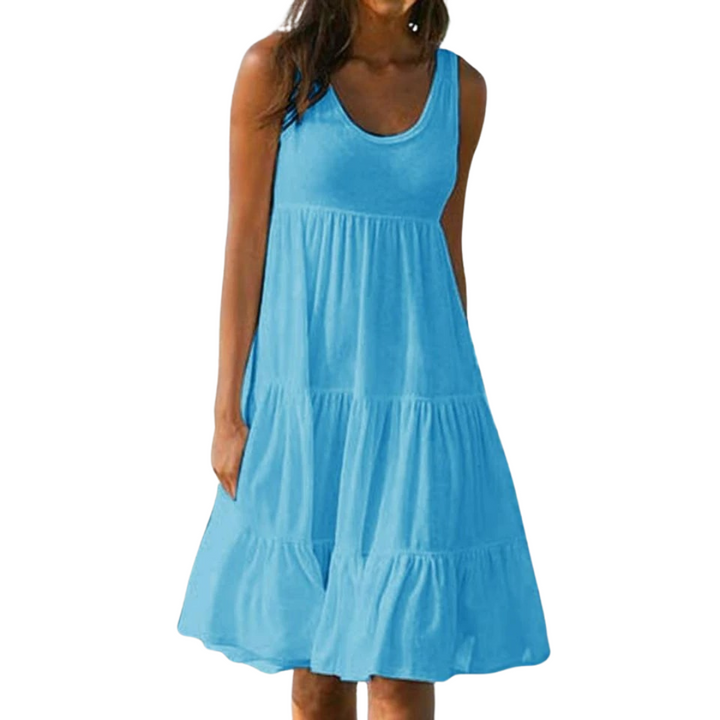 Dame boho-stil sommerkjole med flæse, pink, mønstret, luftig og let, perfekt til solrige dage.