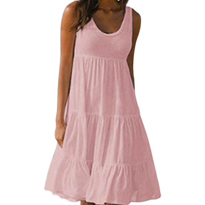 Dame boho-stil sommerkjole med flæse, pink, mønstret, luftig og let, perfekt til solrige dage.
