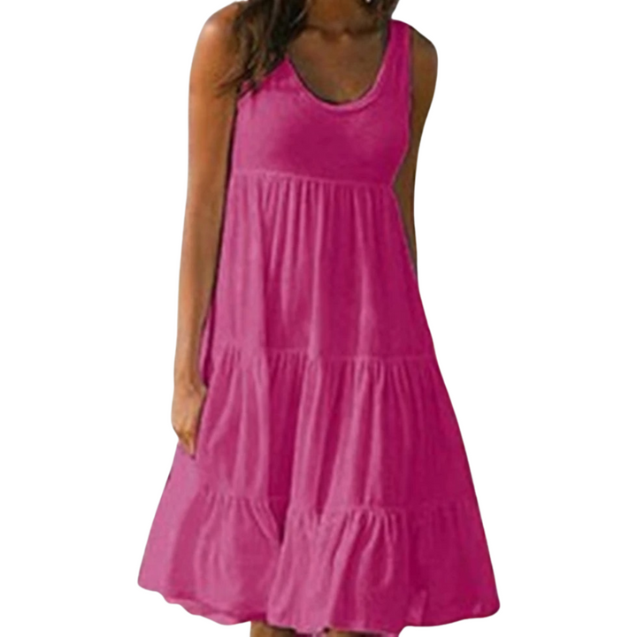 Dame boho-stil sommerkjole med flæse, pink, mønstret, luftig og let, perfekt til solrige dage.