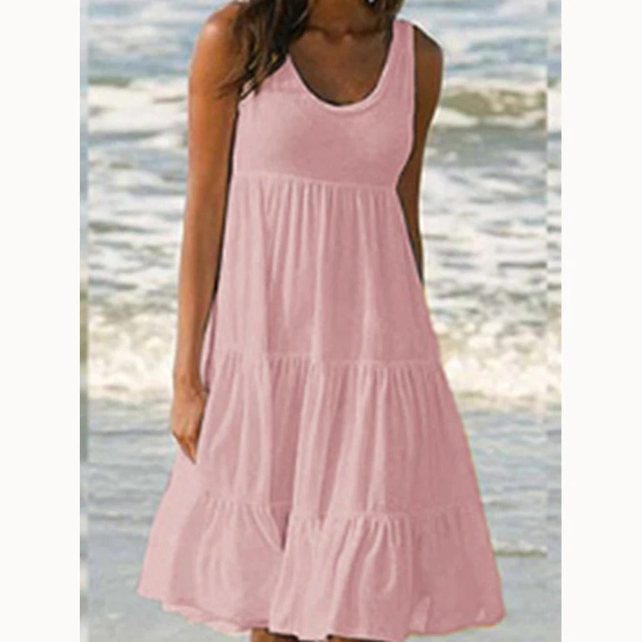 Dame boho-stil sommerkjole med flæse, pink, mønstret, luftig og let, perfekt til solrige dage.