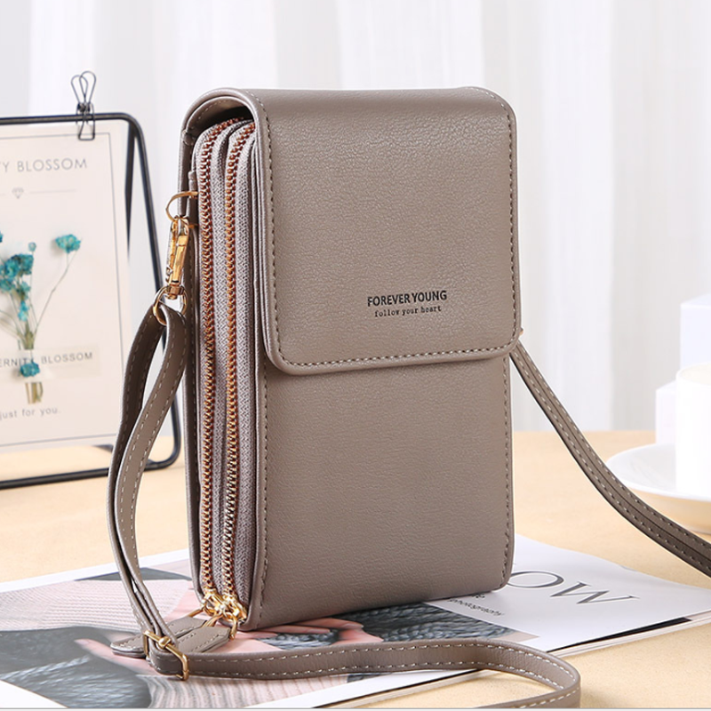 Dame crossbody smartphone taske med touchscreen, grå PU-læder, gennemsigtig touchscreen-lomme, justerbare stropper.