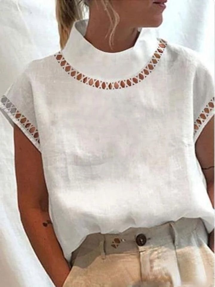Dame elegant top i pink med stilfulde detaljer