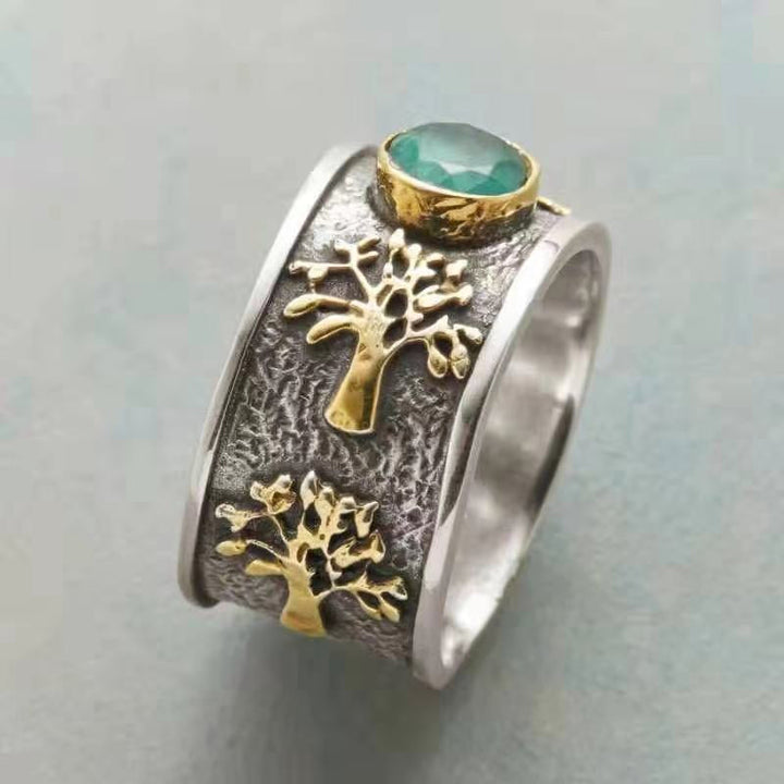 Dame Livets Træ Vintage Ring med kunstig ædelsten, detaljeret mønster, sølvfarvet tone.