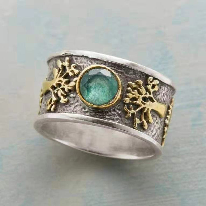 Dame Livets Træ Vintage Ring med kunstig ædelsten, detaljeret mønster, sølvfarvet tone.