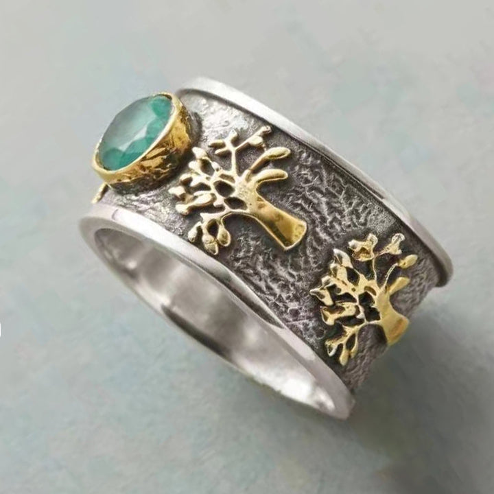 Dame Livets Træ Vintage Ring med kunstig ædelsten, detaljeret mønster, sølvfarvet tone.