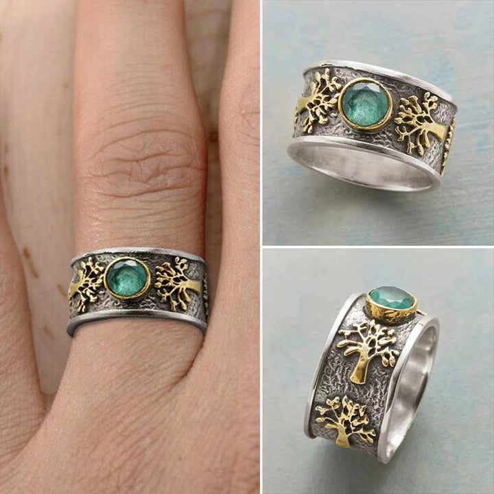 Dame Livets Træ Vintage Ring med kunstig ædelsten, detaljeret mønster, sølvfarvet tone.
